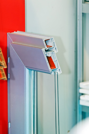 Window profile cut of with metal, glass and insulationの写真素材