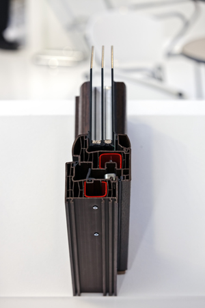 Cross section of dark pvc profile for window; note shallow depth of fieldの写真素材