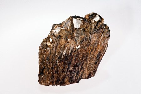 andalusite neso silicate mineral with mica on the white backgroundの写真素材