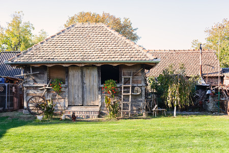 beautiful old ethno house made of wooden planks, note shallow depth of fieldの写真素材