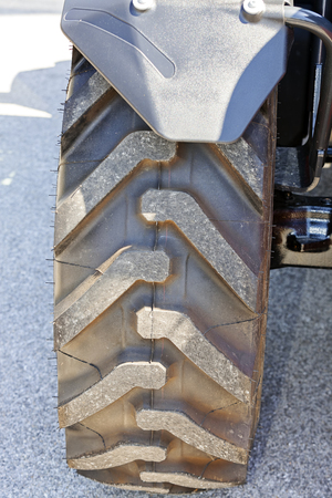 View on wheel of new excavator diggingの写真素材