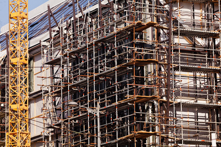 building under construction with scaffolding setの写真素材