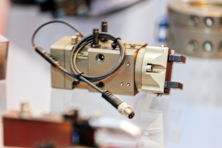 One detail and part of new machine; blurred for backgroundの写真素材