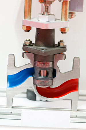 Cross section of fabric engine part with helical spring; note shallow depth of fieldの写真素材
