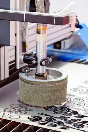 Laser machine for manufacture in industry advanced technology; note shallow depth of fieldの写真素材