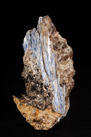 kyanite mineral with garnets on the black  backgroundの写真素材