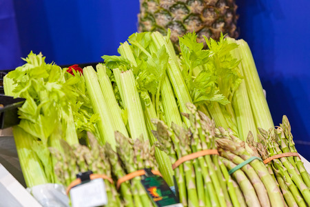 asparagus in bundles for sale, note shallow depth of fieldの写真素材