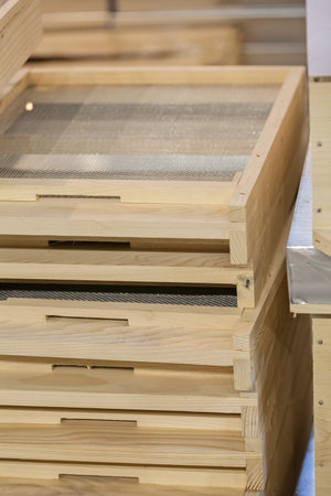 wooden moldings for frames for honeycombs, note shallow depth of field