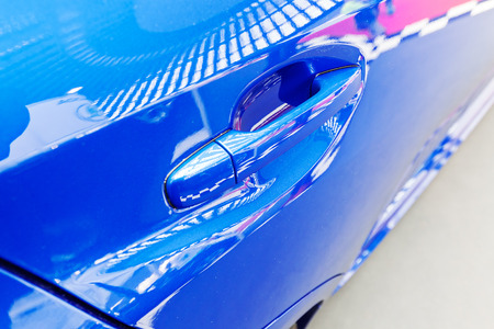 door handles of cars with door lock, note shallow depth of fieldの写真素材