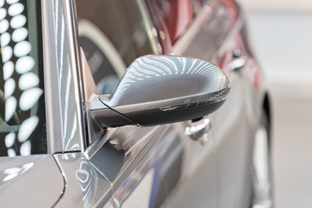 rearview mirror on the motor vehicle, note shallow depth of field