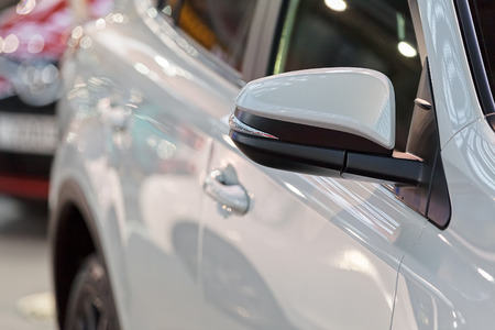 rearview mirror on the motor vehicle, note shallow depth of fieldの写真素材