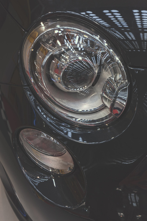 type headlights of the vehicle, note shallow depth of fieldの写真素材