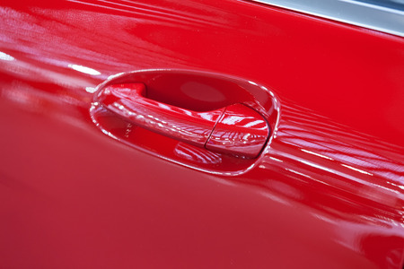 door handles of cars with door lock, note shallow depth of fieldの写真素材
