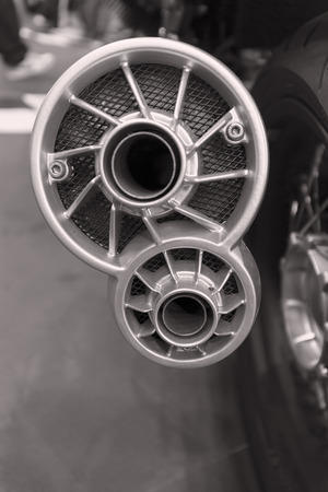 exhaust pipe of car, note shallow depth of fieldの写真素材