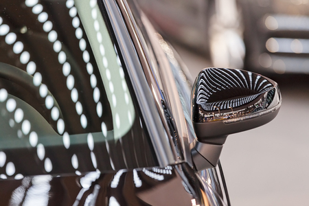 rearview mirror on the motor vehicle, note shallow depth of fieldの写真素材