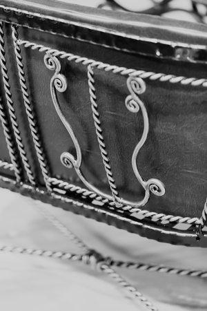 decorated with wrought iron chairs, note shallow depth of fieldの写真素材