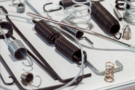 Various metal springs for different purposes, note shallow depth of fieldの写真素材