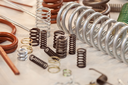 Various metal springs for different purposes, note shallow depth of fieldの写真素材