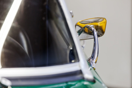 rearview mirror on the motor vehicle, note shallow depth of fieldの写真素材