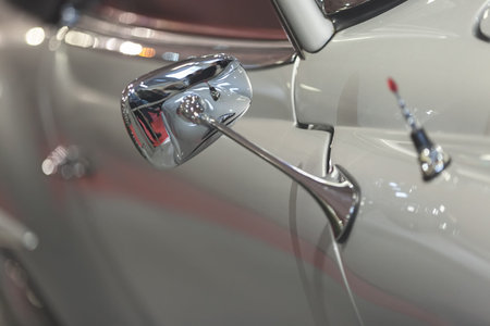 rearview mirror on the motor vehicle, note shallow depth of field