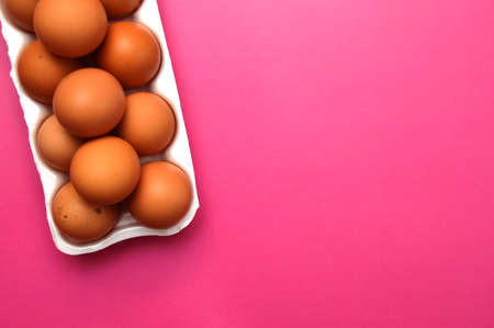 A chicken egg lies in a shipping box and is sold at the supermarket. decorative eggの写真素材