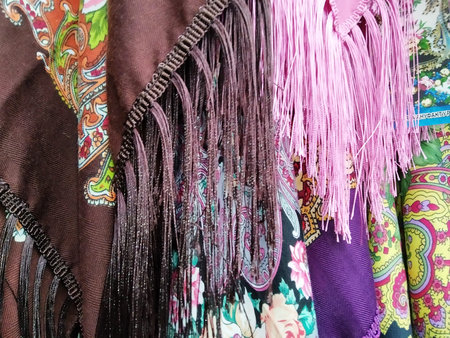 Multicolor painted neckerchiefs. background of colorful materials