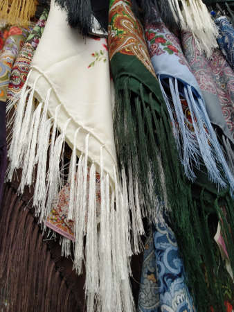 Multicolor painted neckerchiefs. background of colorful materialsの写真素材