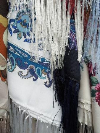Multicolor painted neckerchiefs. background of colorful materials