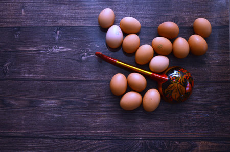 A chicken egg lies in a shipping box and is sold at the supermarket. decorative egg