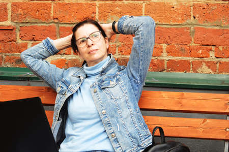 Girl freelancer performs the taskの写真素材