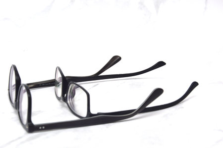 Eyeglasses isolated on white background. Selective focus and shallow depth of field.の写真素材