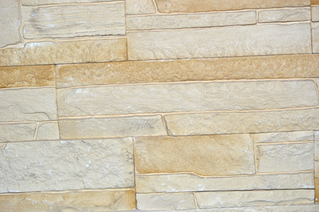 pattern of decorative stone wall surface, closeup of photo and design