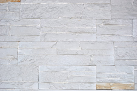 Background of stone wall texture. White brick wall pattern for design.