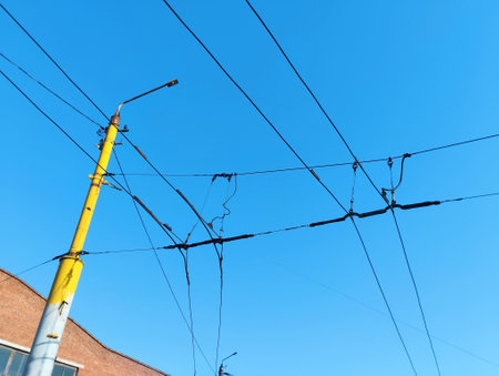 Electrical wires against the blue sky. The concept of electricity.の写真素材