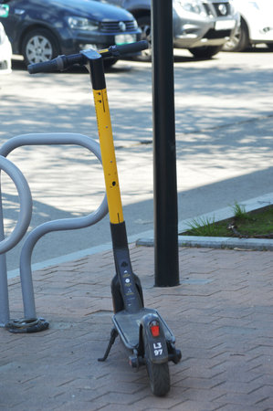 Electric scooter on the street in the city. close-up.の写真素材