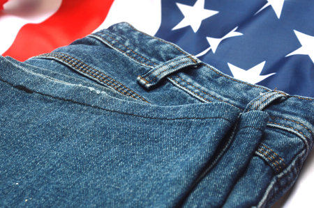 Jeans with American flag as background, close-up view.の写真素材
