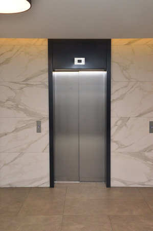 Elevator in a modern office building, closeup of photoの写真素材