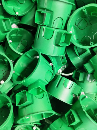 Green plastic pipe caps, close-up, background, texture.の写真素材