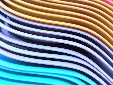Abstract background of multicolored curved lines in blue and yellow colorsの写真素材