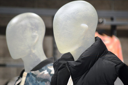 Two mannequins in black clothes on a mannequin