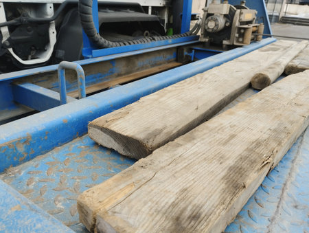 Woodworking machine for wood processing in a factory, closeup of photo
