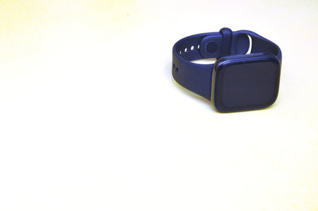 Black smart watch on a white background. The concept of technology.