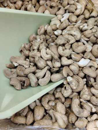 Roasted cashew nuts on display at a market in Thailand.の写真素材
