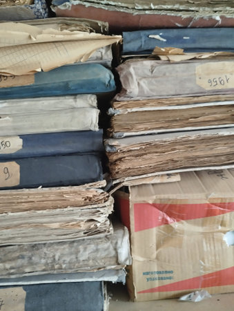 Pile of old books at a book shop. Selective focus.