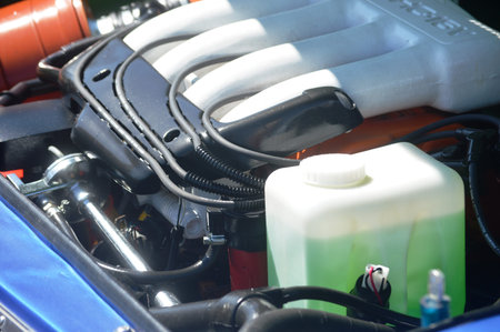 Close up of the engine oil tank of a car in a car show