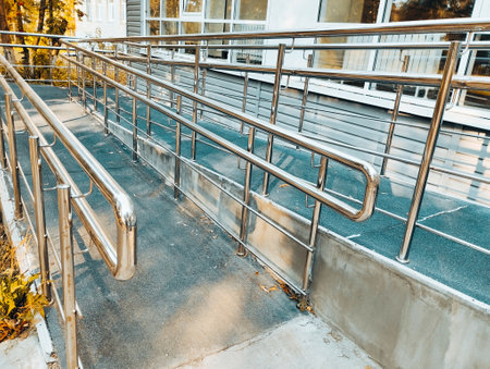 Metal handrails for pedestrians on the city street.の写真素材
