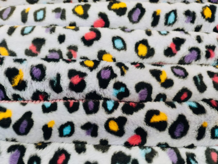 texture of print fabric striped leopard for background, closeup of photoの写真素材