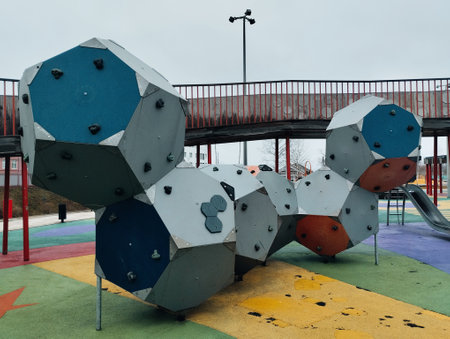 Children's playground in the park on a cloudy day. Moscow, Russiaの写真素材