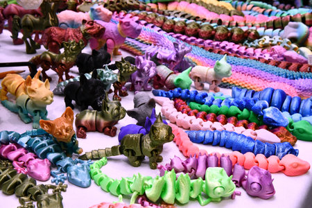 Colorful bracelets on display at a marketの写真素材