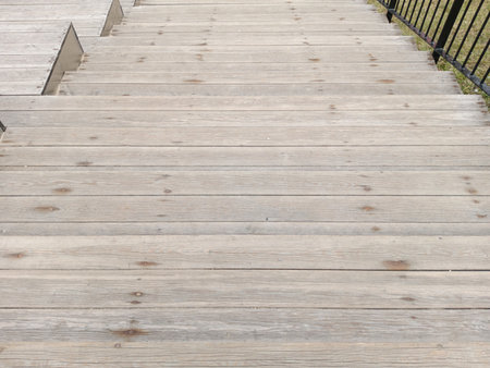 Wooden stairs in the park, close-up, background.の写真素材